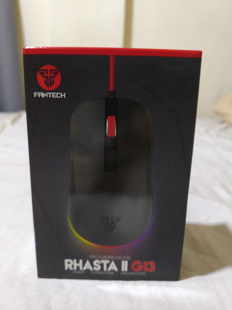 Fantech Rhasta II G13 Pro Gaming Mouse (Category: Mouse & Mousepads) located in Pasig City. Submitted by garage.sale89 (Listing ID 1468634523, Image 1). Description: - Model: Fantech Rhasta II G13 Pro Gaming Mouse - Color: Sleek Black - Sensor: Tournament-level optical sensor up to 2400 CPI - Durability: 4 buttons with 5-million-click lifetime switches - Design: Comfortable ambidextrous shape suitable for any grip style - Connectivity: Braided re