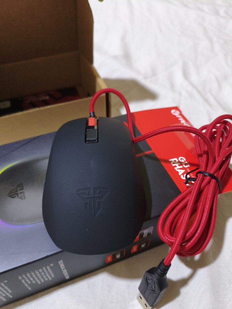 Fantech Rhasta II G13 Pro Gaming Mouse (Category: Mouse & Mousepads) located in Pasig City. Submitted by garage.sale89 (Listing ID 1468634523, Image 2). Description: - Model: Fantech Rhasta II G13 Pro Gaming Mouse - Color: Sleek Black - Sensor: Tournament-level optical sensor up to 2400 CPI - Durability: 4 buttons with 5-million-click lifetime switches - Design: Comfortable ambidextrous shape suitable for any grip style - Connectivity: Braided re