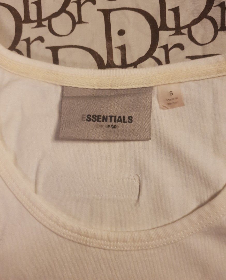 Fear of God Essentials tank top (Category: Sleeveless) located in San Fernando. Submitted by retro.district. (Listing ID 1468712367, Image 3). Description: - Fear of God Essentials Tank top - Size: Small (M) Medium (W) - Condition: Excellent - No issue.