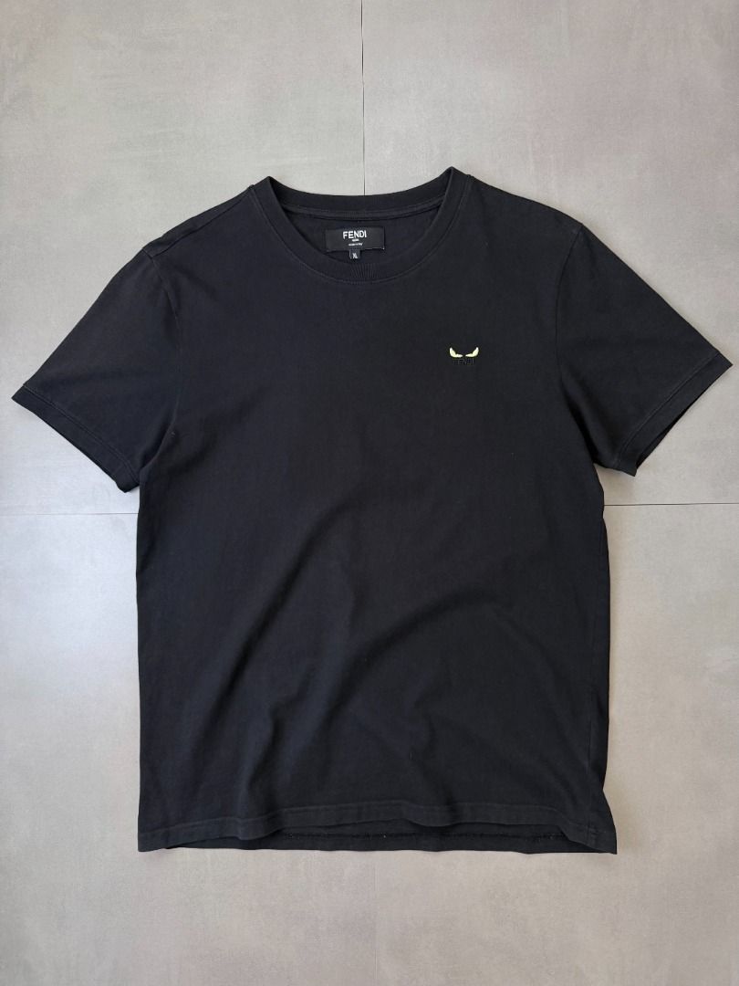 Fendi Black tee shirt (Category: Tshirts & Polo Shirts ) located in Cabanatuan. Submitted by argarments.ph (Listing ID 1468576410, Image 2). Description: Tagged: XL on tag Width 21" | Length 28" Condition: Excellent condition Issue(s): -.