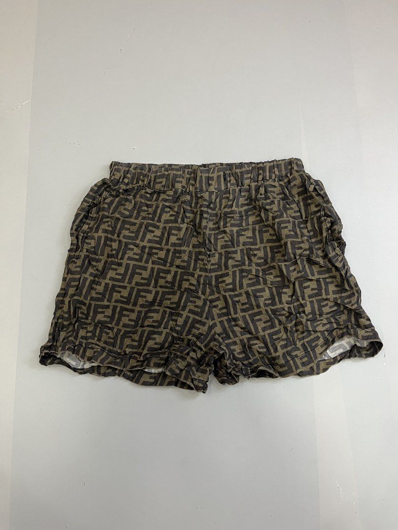 Fendi FF Monogram Silk Shorts (Category: Shorts) located in Mabalacat. Submitted by aas_thriftfings (Listing ID 1468577290, Image 1). Description: - Brand: Fendi - Material: 100% pure silk (super soft and lightweight) - Design: Iconic all-over FF monogram pattern - Waist: Drawstring elastic waist for an easy, comfortable fit - Origin: Made in Italy - Size: Tagged size TU - Condition: Clean inside and out with all original labels attached.