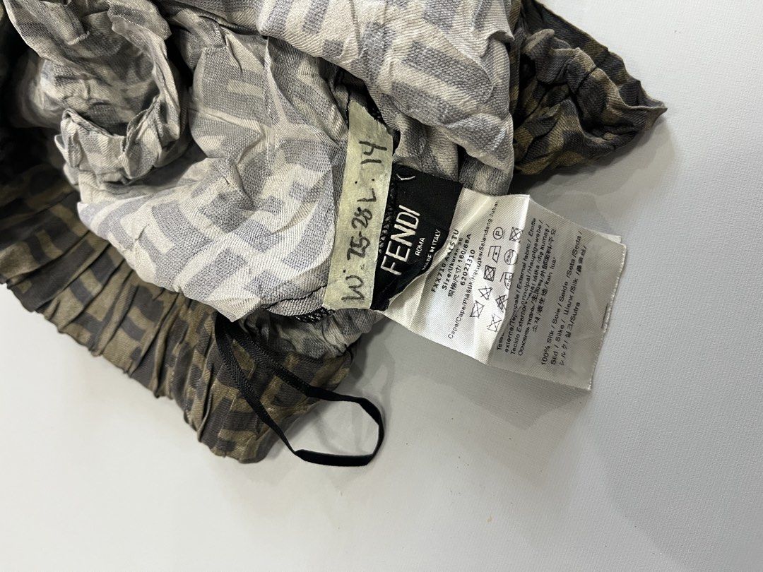 Fendi FF Monogram Silk Shorts (Category: Shorts) located in Mabalacat. Submitted by aas_thriftfings (Listing ID 1468577290, Image 2). Description: - Brand: Fendi - Material: 100% pure silk (super soft and lightweight) - Design: Iconic all-over FF monogram pattern - Waist: Drawstring elastic waist for an easy, comfortable fit - Origin: Made in Italy - Size: Tagged size TU - Condition: Clean inside and out with all original labels attached.