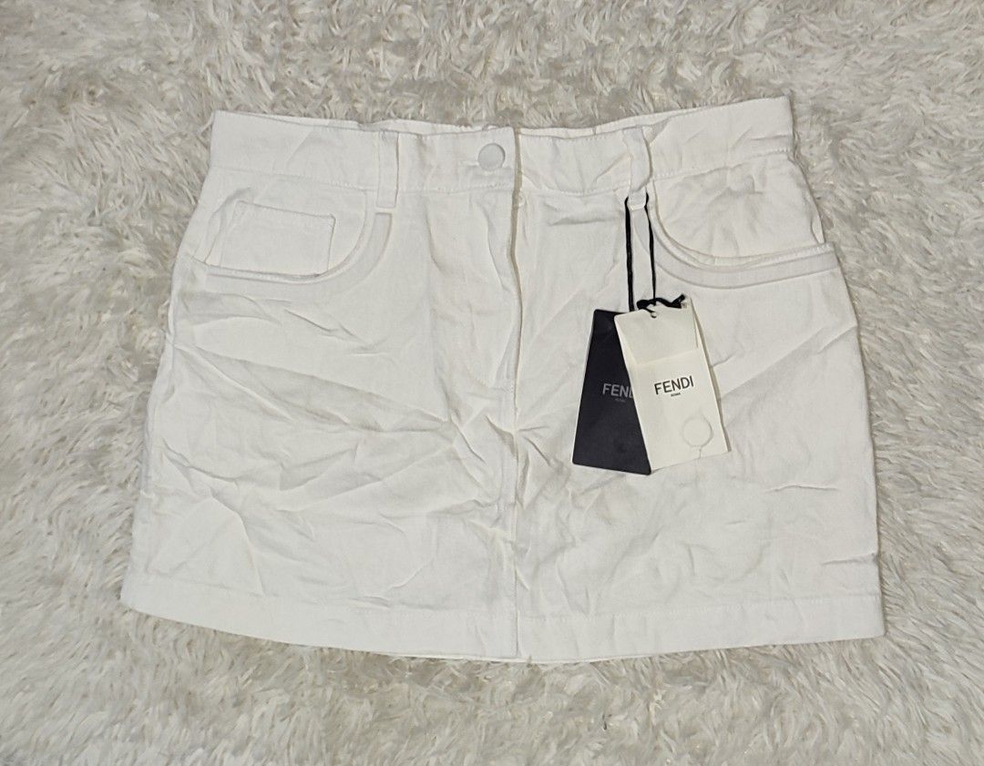 Fendi Mini Denim Skirt White (Category: Skirts) located in Solano. Submitted by johnpaulsanmiguel (Listing ID 1468594537, Image 2). Description: Size 40 on tag Waist 30-31 Length 14 Brandnew with hangtags No issues gusot lang nakuha sa arrival 10/10.