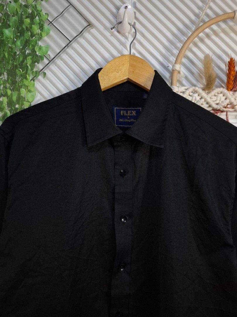 Flex Black Long Sleeve Button Down Shirt Medium (Category: Sets & Coordinates) located in Bulacan. Submitted by cathycampo51092 (Listing ID 1468619313, Image 1). Description: - Brand/Style: Flex black long sleeve shirt - Color: Solid black with matching dark buttons - Collar: Standard button-down - Size: Medium (21 inches chest width, 28 inches length) - Versatility: Great staple piece for casual wear or smart casual outfits.