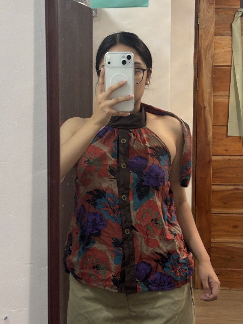Floral halter tie top (Category: Sleeveless) located in Bulacan. Submitted by reiixx (Listing ID 1468666625, Image 1). Description: Small frame *buttoned * backless & garterized *vintage style *this is a reworked top.