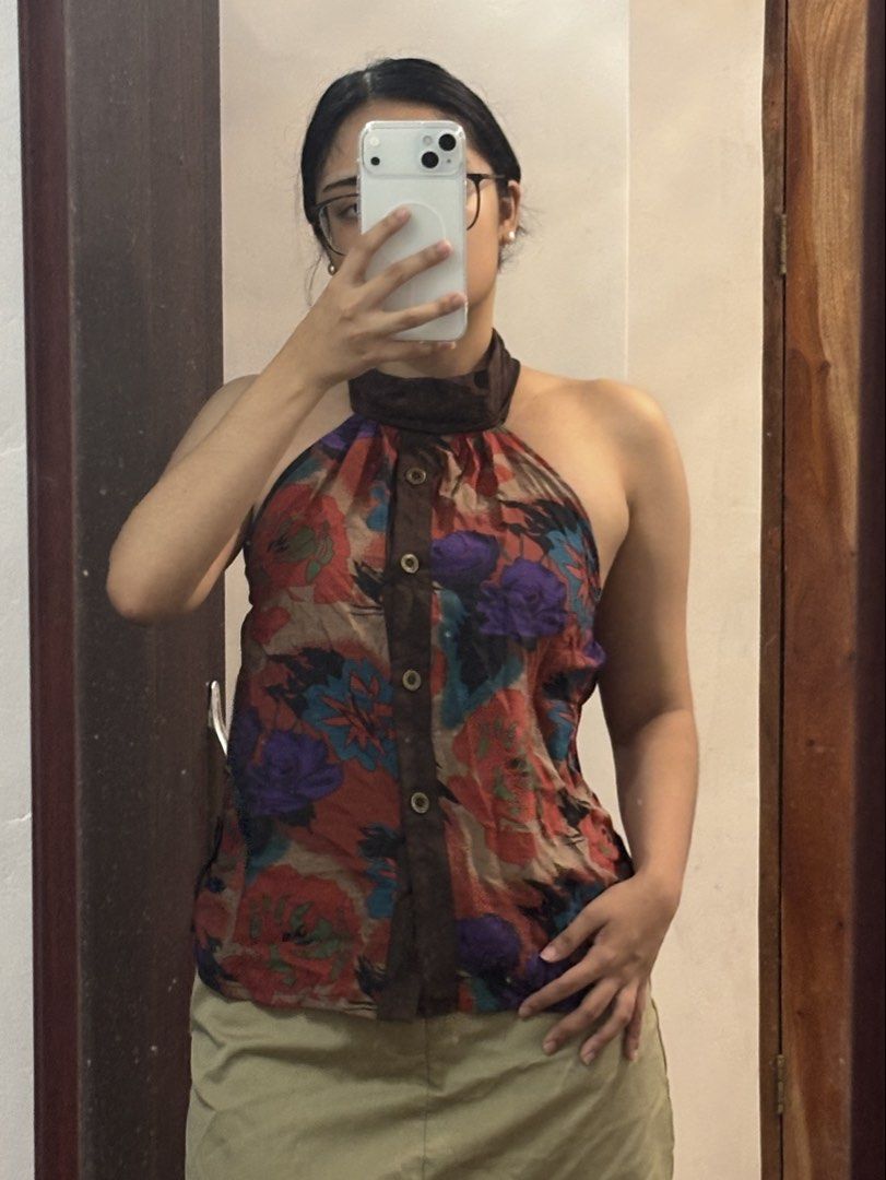 Floral halter tie top (Category: Sleeveless) located in Bulacan. Submitted by reiixx (Listing ID 1468666625, Image 2). Description: Small frame *buttoned * backless & garterized *vintage style *this is a reworked top.