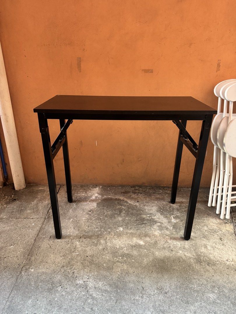 Folding Study Table (Category: Tables & Sets) located in Santa Rosa. Submitted by caressgonzales (Listing ID 1468611319, Image 2). Description: Moving out sale!!! 🙌🏻 - Foldable table - Size: 40cm (W) x 80cm (L) - Condition: Sturdy and fully functional with minor scuffs from normal use - Folds flat easily for convenient storage and transport - Ideal For Small spaces, dorm rooms, or home workspaces Can do meet up at SMDC Green 2 Residences, Dasma
