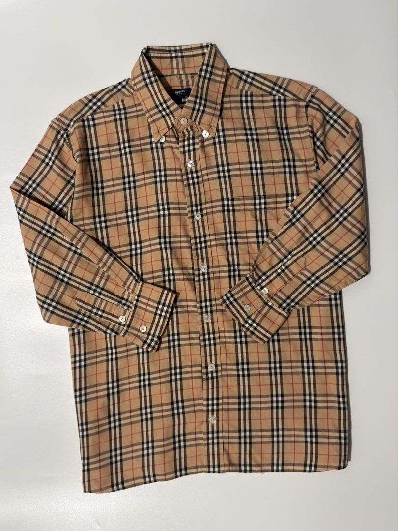 For sale (Category: Longsleeves) located in Marikina City. Submitted by hsatstnemesabeht (Listing ID 1468633047, Image 3). Description: Vtg burberry plaid Size 40 Dimension Width 22 | Length 27.5 Excellent condition Flaws : All buttons repair the owner check last pic .