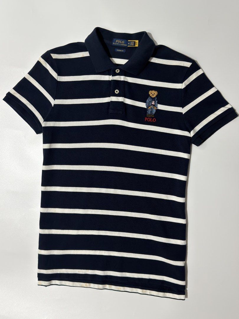 For sale (Category: Shirts) located in Marikina City. Submitted by skkagawad041591 (Listing ID 1468635908, Image 3). Description: PRL classic fit polo bear polo shirt Size medium Dimension Width 18 | Length 26.5 | Back 27.5 Like new Flaws : Stain sa mga white part needwash.