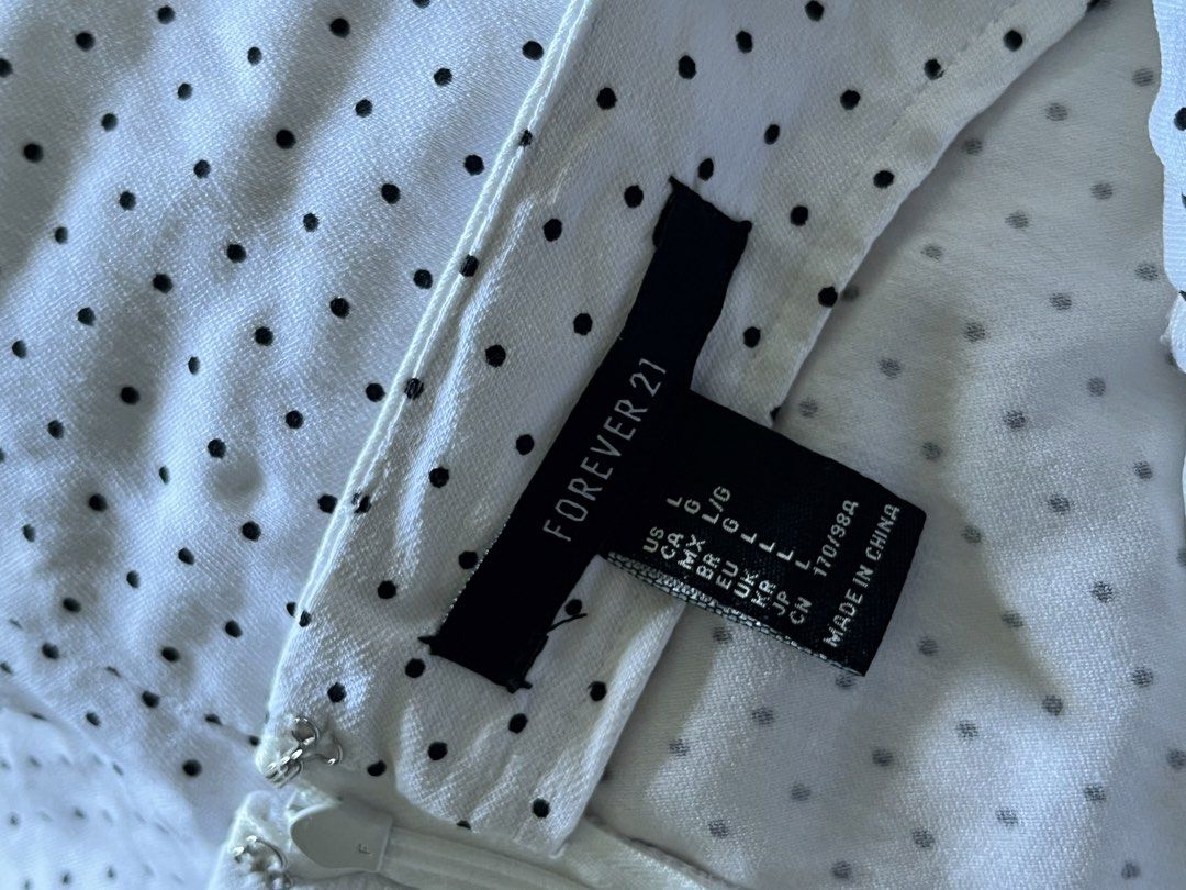 Forever 21 Polka Dot Midi Dress (Category: Dresses) located in Manila. Submitted by irish_closet (Listing ID 1468540457, Image 3). Description: - Size runs small, L on tag but had it altered a bit to fit me. - xs to s.