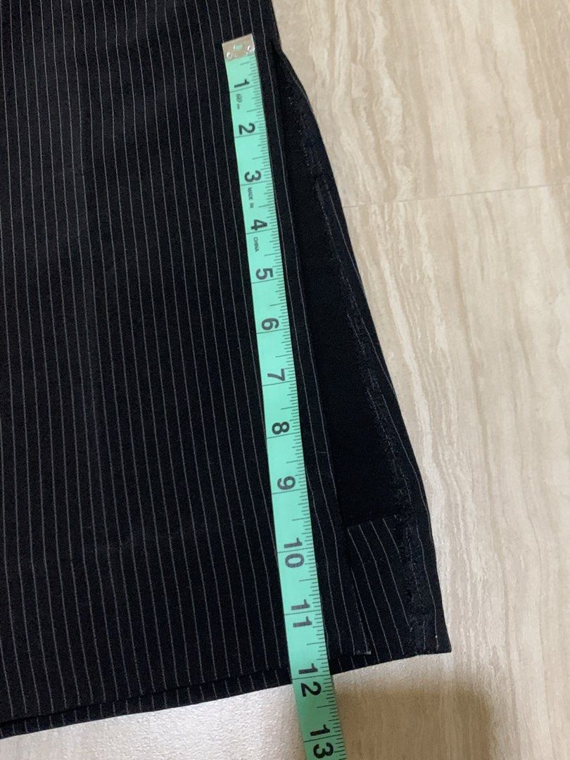 Formal Stripped Black Pants Office Bootcut Pants with Slit (Category: Jeans) located in Abucay. Submitted by charkolefishies (Listing ID 1468545878, Image 3). Description: Black Stripped Pants Suits Formal Attire, Office, Casual, Smart Casual Has a cool slit at the bottom, goes well with boots and heels Never Worn Thick and great quality fabric Has a bit of powder like stain from cabinet Measurements in pictures!!.
