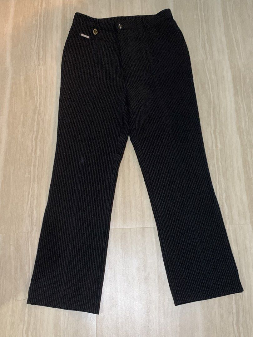 Formal Stripped Black Pants Office Bootcut Pants with Slit (Category: Jeans) located in Abucay. Submitted by charkolefishies (Listing ID 1468545878, Image 1). Description: Black Stripped Pants Suits Formal Attire, Office, Casual, Smart Casual Has a cool slit at the bottom, goes well with boots and heels Never Worn Thick and great quality fabric Has a bit of powder like stain from cabinet Measurements in pictures!!.