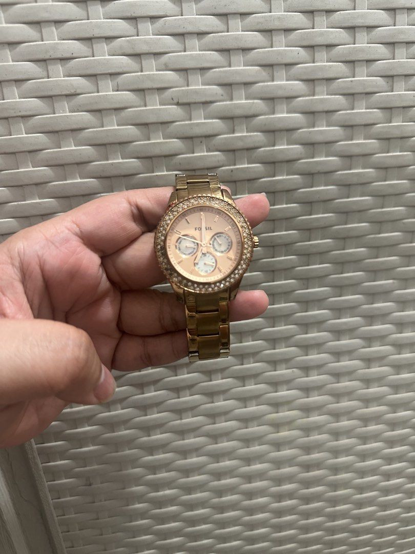 Fossil Rose Gold Crystal Bezel Chronograph Watch (Category: Women's Watches) located in Manila. Submitted by nihn02 (Listing ID 1468540167, Image 1). Description: - Brand: Fossil Original - Color: Elegant Rose Gold - Features: 3 functional sub-dials and clear dial markers - Accents: Sparkling crystals embedded all around the bezel - Material: Durable stainless steel link bracelet band - Closure: Standard clasp closure with engraved Fossil logo - 