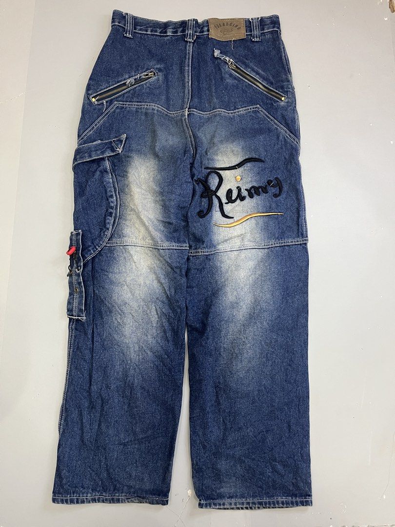 Fox Racing Cargo Denim Jeans Blue Size 32 (Category: Jeans) located in Mabalacat. Submitted by aas_thriftfings (Listing ID 1468578135, Image 2). Description: - Brand: Fox Racing - Style: Cargo denim jeans with multi-pocket utility design - Color: Blue with contrast stitching - Size: 32 waist (42 length on tag) - Details: Large embroidered script logo on back leg, patch logo on front pocket, zippered back pockets, and metal snap details - Conditio