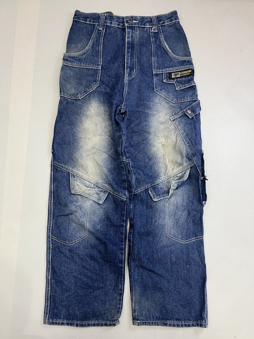 Fox Racing Cargo Denim Jeans Blue Size 32 (Category: Jeans) located in Mabalacat. Submitted by aas_thriftfings (Listing ID 1468578135, Image 1). Description: - Brand: Fox Racing - Style: Cargo denim jeans with multi-pocket utility design - Color: Blue with contrast stitching - Size: 32 waist (42 length on tag) - Details: Large embroidered script logo on back leg, patch logo on front pocket, zippered back pockets, and metal snap details - Conditio