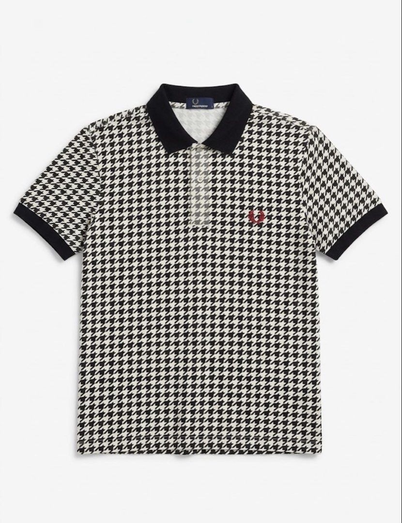 Fred Perry Houndstooth Polo Shirt Black White M (Category: Tshirts & Polo Shirts ) located in Minglanilla. Submitted by twodegrees (Listing ID 1468538559, Image 1). Description: - Brand: Fred Perry - Style: Classic polo shirt with black and white houndstooth pattern - Size: M - Material: 100% cotton - Details: Black collar, black sleeve cuffs, standard three-button placket, and iconic red laurel wreath embroidery - Origin: Made in Hong Kong - Con