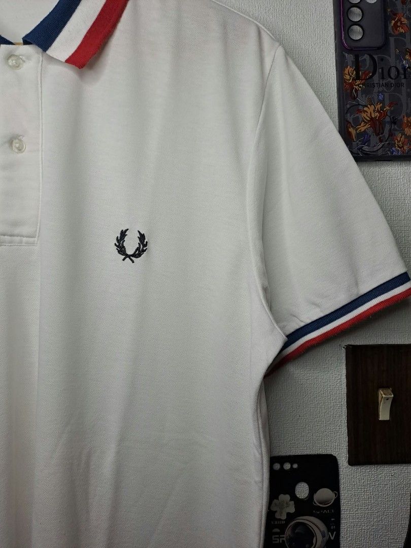 Fred Perry Twin - Tipped (Category: Formal Shirts) located in Quezon City. Submitted by yaseen73 (Listing ID 1468709044, Image 2). Description: Fred Perry Twin - Tipped Polo Shirt With Red, White and Blue Cotton 100% / No Wash Tags ❌ Wearing Size : XL on Tag Dimensions : Please Refer to the Photo Color Rate : 9.9/10 No Issue In Excellent Condition 799.00 Courier : J&T Lalamove MOP : G C A S H B A N K T R A N S F E R Seller's Location : 📍K1, brgy