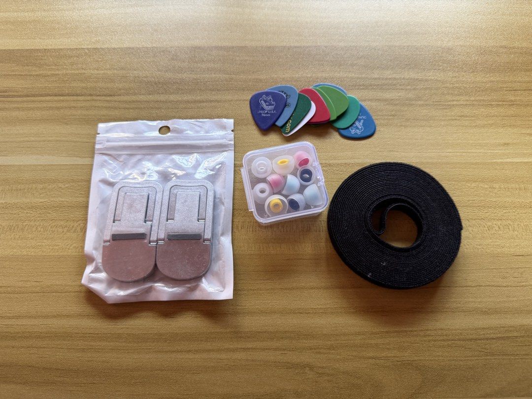 FREE ITEMS (Category: Musical Instruments) located in Pasig City. Submitted by harold.3240 (Listing ID 1468501822, Image 1). Description: All yours for FREE! - Assorted colorful guitar picks - Replacement silicone ear tips with a clear storage case - Two foldable metal laptop stands in a sealed pouch - One roll of black hook-and-loop velcro cable management tape Pick up only from Cainta, Rizal.