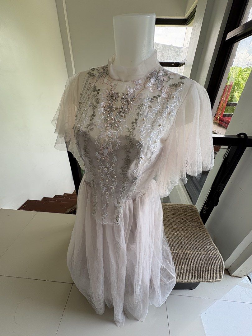 FREE SF evening dress (Category: Dresses) located in Manila. Submitted by lavieelle (Listing ID 1468569637, Image 3). Description: - princess style evening dress - dusty grey shade with embellished/beaded high-neck illusion bodice, layered sheer tulle, and short floating sleeves - flattering when worn - brand new, no flaws - rfs: decluttering .