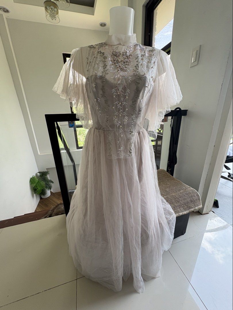 FREE SF evening dress (Category: Dresses) located in Manila. Submitted by lavieelle (Listing ID 1468569637, Image 2). Description: - princess style evening dress - dusty grey shade with embellished/beaded high-neck illusion bodice, layered sheer tulle, and short floating sleeves - flattering when worn - brand new, no flaws - rfs: decluttering .
