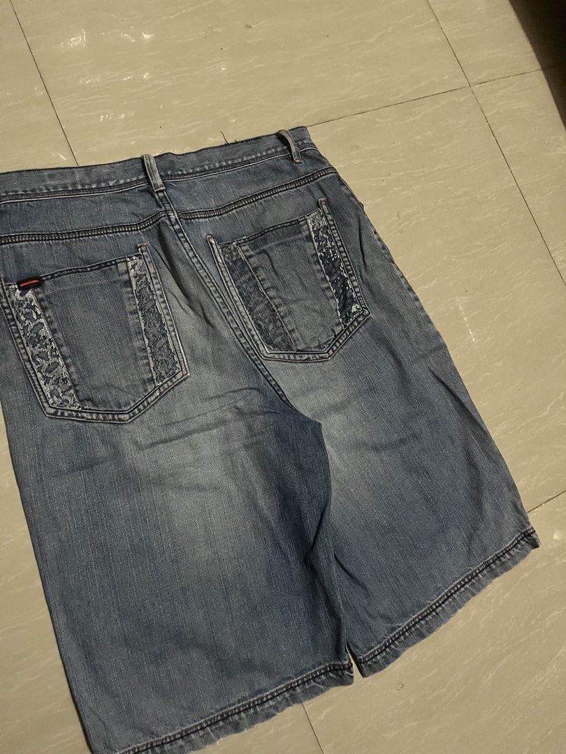 FUBU Y2K LONG JORTS (Category: Shorts) located in Manila. Submitted by thrift2lifestyle (Listing ID 1468604489, Image 2). Description: FUBU Y2K LONG JORTS WELL USED W34 L26 L.O12 ISSUE: CRACK PRINTS, DISTRESSED 550.