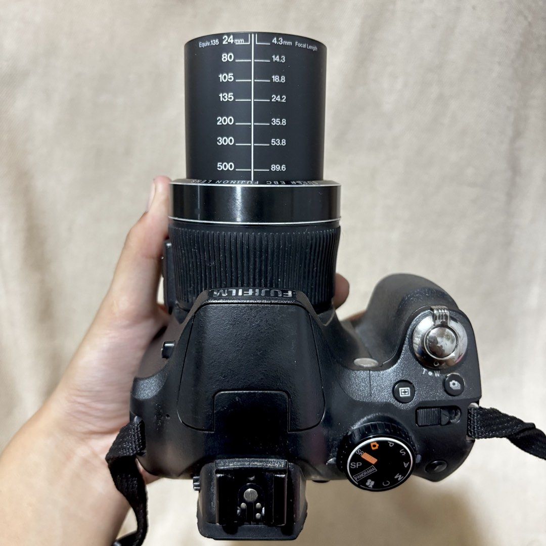 Fujifilm Finepix SL300 (Category: Cameras) located in Quezon City. Submitted by veesvault (Listing ID 1468541084, Image 1). Description: Fujifilm Finepix SL300— reposting until sold! 🏷️NEGOTIABLE IF SURE BUYER! 🎉Best for photojourn & outings! 🎉SUPERB & CRISP OUTPUT + 30x zoom 🎉complete inclusions—gagamitin nalang! 🎉ALL FUNCTIONS WORKING (flash, red flash, zoom, vid, mic, speaker, buttons, dials, etc.) 🎉14 megapixels & 30x optical zoom 🎉no 
