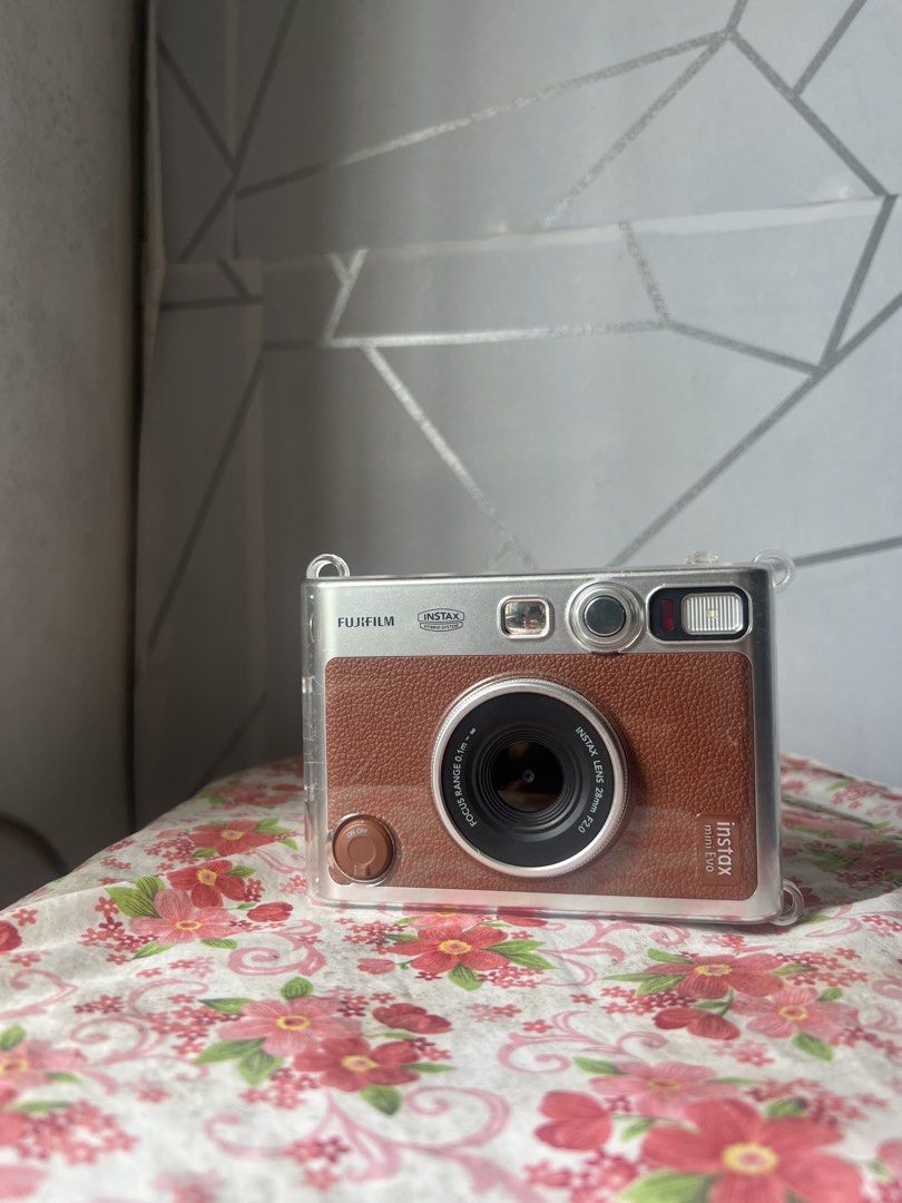 FUJIFILM Instax Mini Evo (Category: Cameras) located in Manila. Submitted by shavonee04 (Listing ID 1468539125, Image 2). Description: With free case Original box Included Slightly used Price is negotiable Dm to avail.