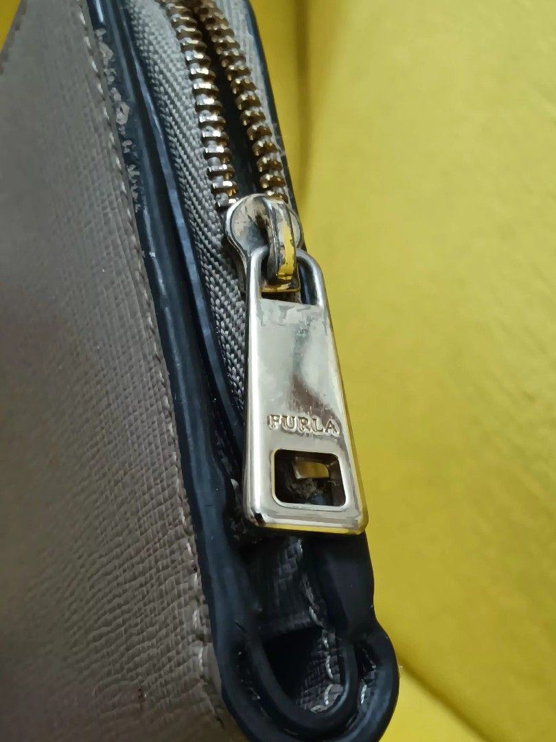 Furla waller card holder (Category: Wallets & Card holders) located in Pasay City. Submitted by secretas (Listing ID 1468514462, Image 1). Description: well usued. the leather still good inside and outside. just the edge rubber.