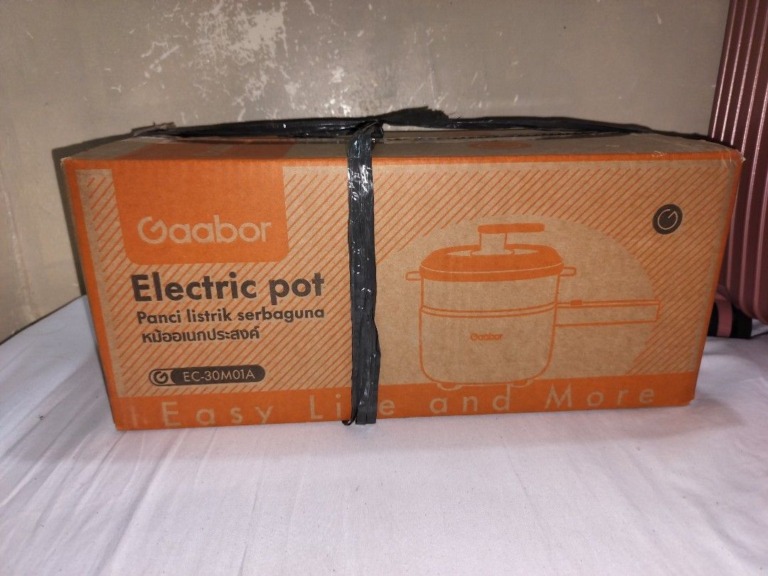 Gaabor Electric Pot EC-30M01A (Category: Cookware & Accessories) located in Pasay City. Submitted by onlineshop.ni.ron (Listing ID 1468504523, Image 1). Description: - Brand: Gaabor - Model: EC-30M01A - Condition: Brand new, unopened, and sealed in original factory packaging with plastic strap - Features: Multi-purpose electric pot, ideal for daily cooking and easy meals For inquiries you can send me a direct message. I am always online. Can also