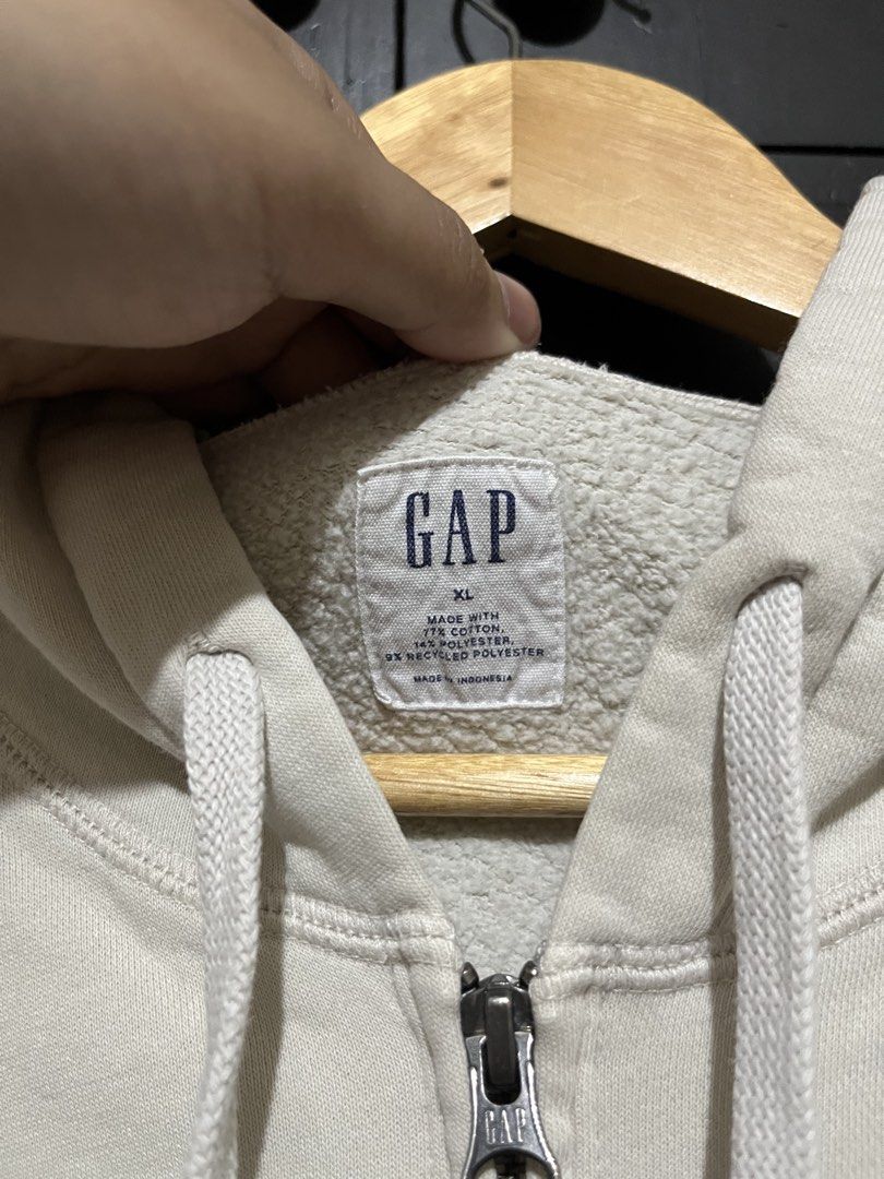 Gap Cream Zip Up Jacket (Category: Coats, Jackets and Outerwear) located in Santa Cruz. Submitted by wecareaboutthingswedonothave (Listing ID 1468664185, Image 2). Description: Width - 26 Length - 27 XL on tag Issue: Stains. See pictures. Shipping will be shouldered by the buyer..