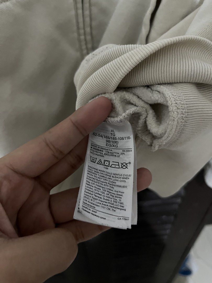 Gap Cream Zip Up Jacket (Category: Coats, Jackets and Outerwear) located in Santa Cruz. Submitted by wecareaboutthingswedonothave (Listing ID 1468664185, Image 3). Description: Width - 26 Length - 27 XL on tag Issue: Stains. See pictures. Shipping will be shouldered by the buyer..