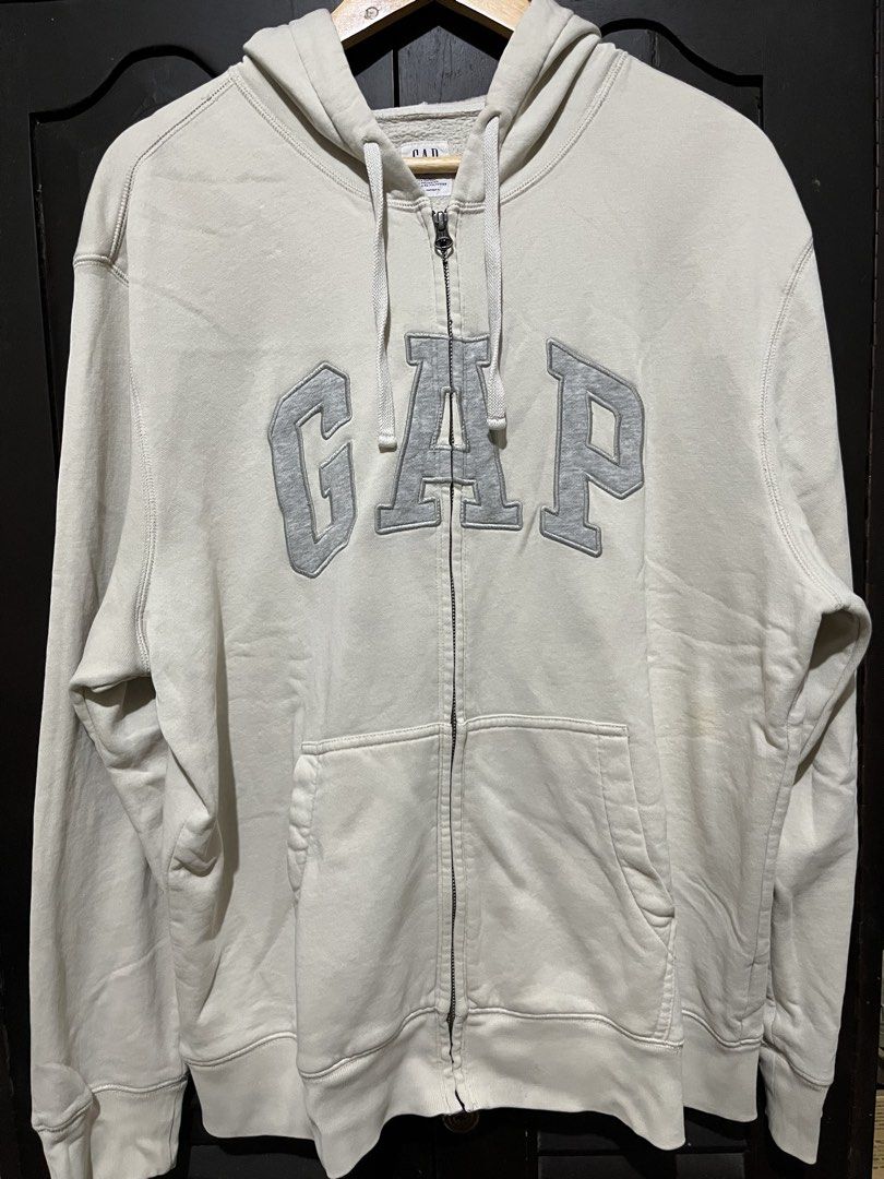 Gap Cream Zip Up Jacket (Category: Coats, Jackets and Outerwear) located in Santa Cruz. Submitted by wecareaboutthingswedonothave (Listing ID 1468664185, Image 1). Description: Width - 26 Length - 27 XL on tag Issue: Stains. See pictures. Shipping will be shouldered by the buyer..