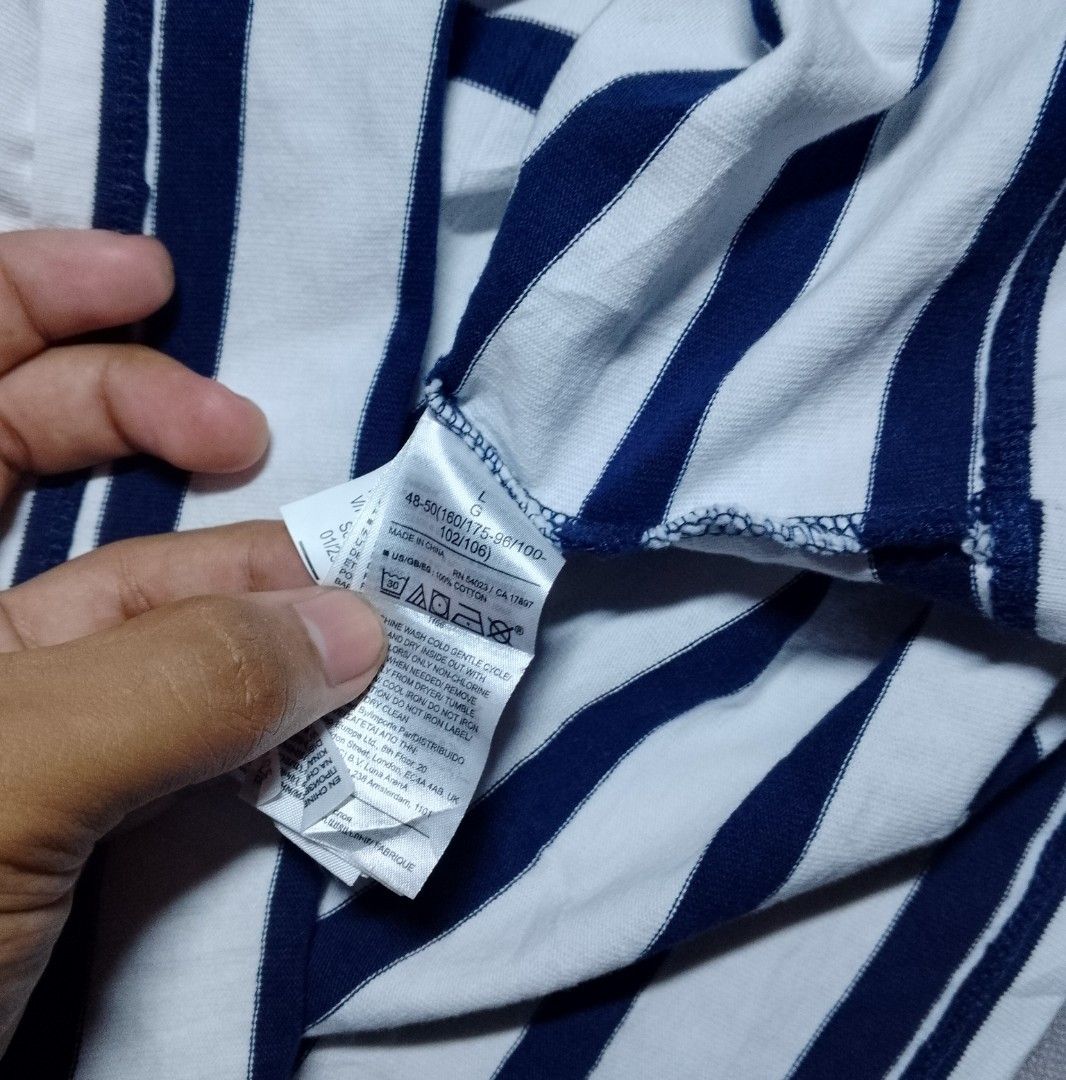 GAP Striped Polo Shirt (Category: Formal Shirts) located in Iligan City. Submitted by jydsale. (Listing ID 1468627279, Image 3). Description: 💙 GAP Striped Polo Shirt 🤍 👕 Brand: GAP 🎨 Color: Navy Blue & White 📏 Size: Large (L) ✨ Classic horizontal stripe design 🧵 Embroidered GAP logo on the chest 👔 Stylish collar with V-neck opening 👖 Easy to pair with jeans, shorts, or trousers 💰 ₱300 — Negotiable 📩 Message me for measurements. 🚚 Ship