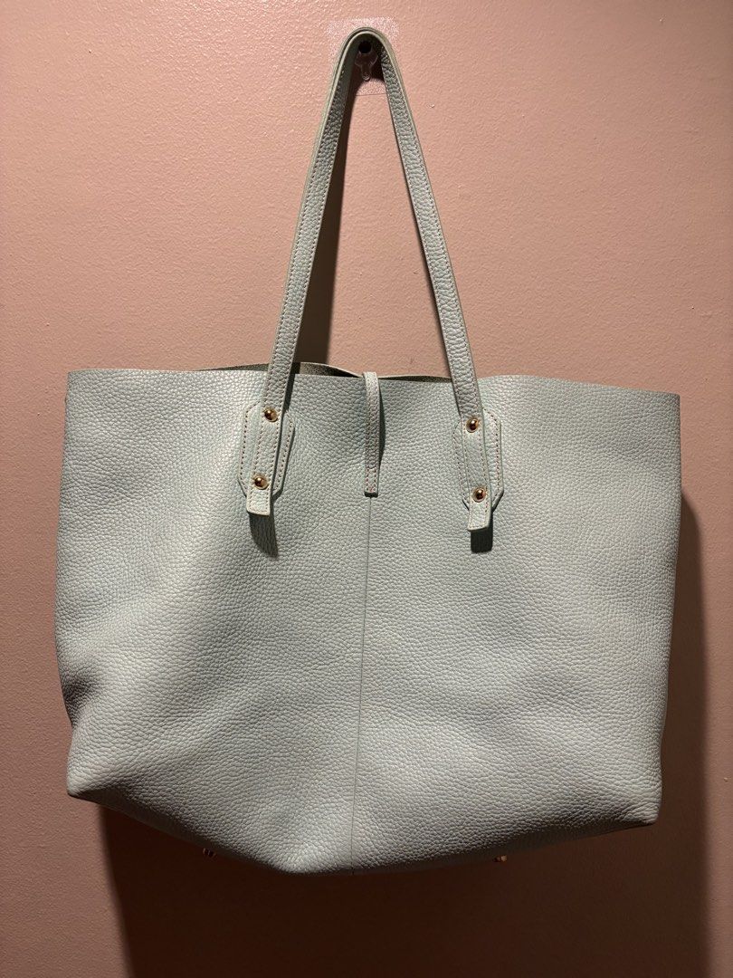 Genuine Leather Authentic McLaren Mint Green Tote (Category: Luxury Bags & Wallets) located in Manila. Submitted by eliteinme (Listing ID 1468665400, Image 3). Description: Genuine Leather Lightweight Bifg Tote. Inside is dirty but very nice outside. .