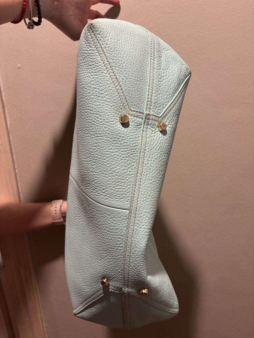 Genuine Leather Authentic McLaren Mint Green Tote (Category: Luxury Bags & Wallets) located in Manila. Submitted by eliteinme (Listing ID 1468665400, Image 2). Description: Genuine Leather Lightweight Bifg Tote. Inside is dirty but very nice outside. .