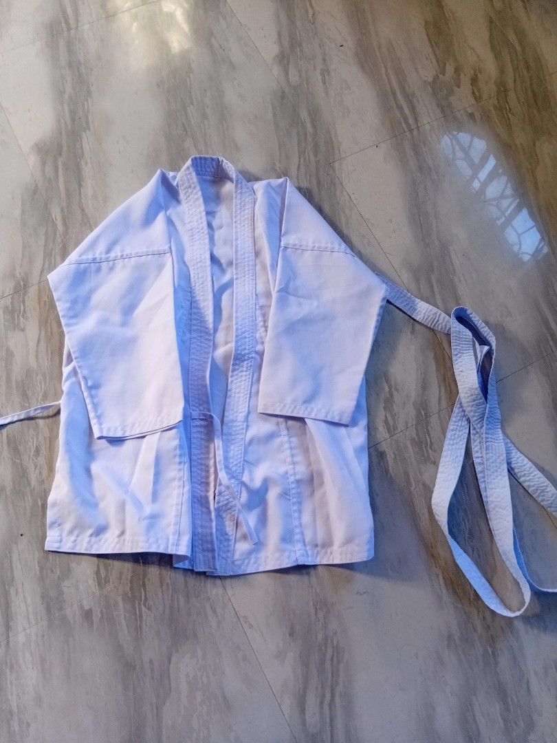 Gi set for karate/judo with belt (Category: Sets & Coordinates) located in Baguio. Submitted by steambunny (Listing ID 1468636474, Image 1). Description: medium on tag good for 5'1 and 5'2 height need wash kasi may konting mantsa (washable) makapal tela 100% bought it mismo sa school 1200, selling it for 900 slightly negotiable.