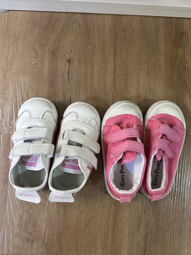 Girls Shoes (Category: Babies & Kids Fashion) located in Paranaque City. Submitted by every_thingph (Listing ID 1468712101, Image 1). Description: - Bundle includes: 2 pairs of toddler canvas shoes - Pair 1: White with pink accents and branding - Pair 2: Solid pink canvas with white rubber soles - Closure: Easy double Velcro straps on both pairs for quick wear - Condition: Normal signs of wear on toes and soles - Ideal for everyday casual use.