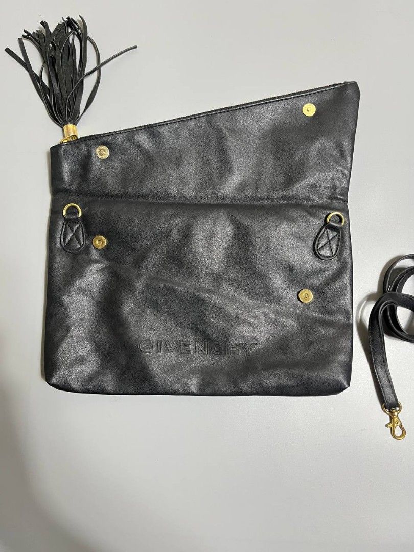 Givenchy Black Leather Envelope Clutch Crossbody Bag (Category: Cross-body Bags) located in Lucena. Submitted by sth.archvl (Listing ID 1468523122, Image 3). Description: In great condition No flaws Measurements Width: 12.5 inches Length: 8 inches .
