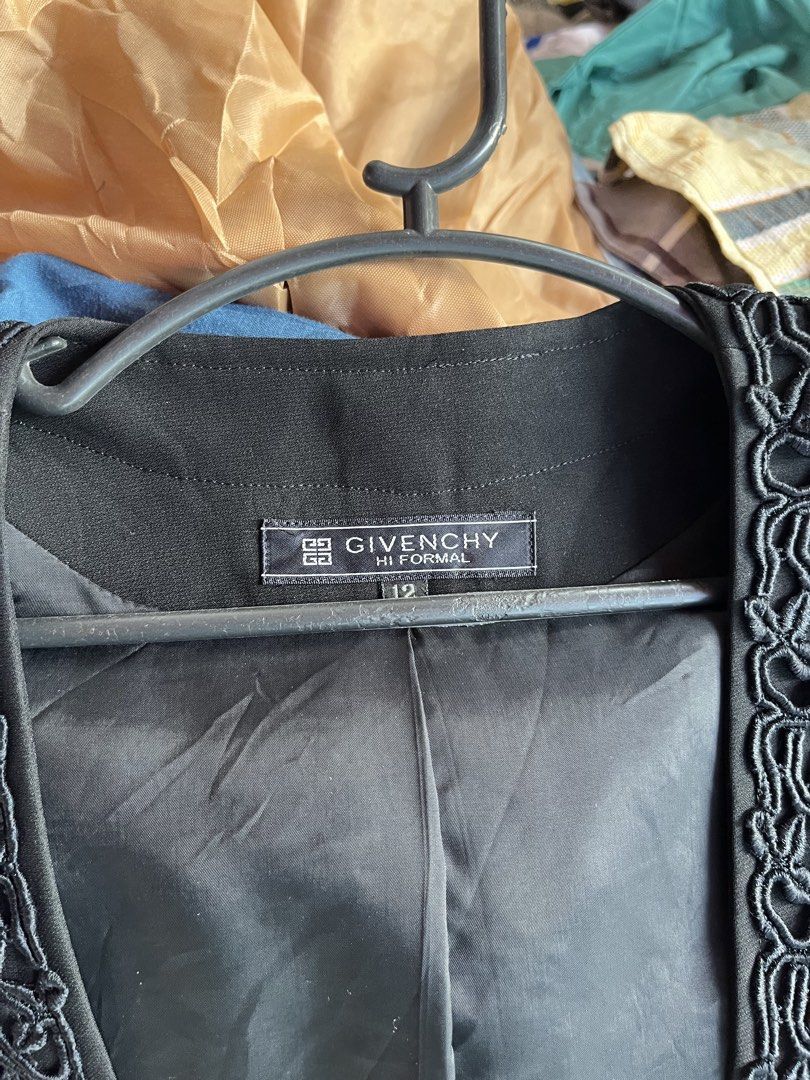Givenchy Hi Formal Black Bolero Jacket Size 12 (Category: Coats, Jackets and Outerwear) located in Pilar. Submitted by fast-flip-ni-miko. (Listing ID 1468550811, Image 2). Description: - Brand: Givenchy Formal - Color: Black - Size: 12 - Material: 60% triacetate, 40% rayon blend (fully lined) - Design: Open front with braided trim along edges and cuffs - Cut: Short cropped with structured shoulders - Condition: Excellent pre-loved condition - Mod