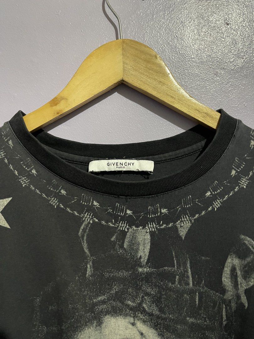 Givenchy Jesus Tee (Category: Tshirts & Polo Shirts ) located in Angeles City. Submitted by andreiboughts (Listing ID 1468645415, Image 3). Description: Length: 29 Width: 22 Condition: 8.5/10 Color rate: 8.5/10 Issue (s): stretched neckline, minimal loose stitching, color rate Complete Tags ✅ Small on tag.