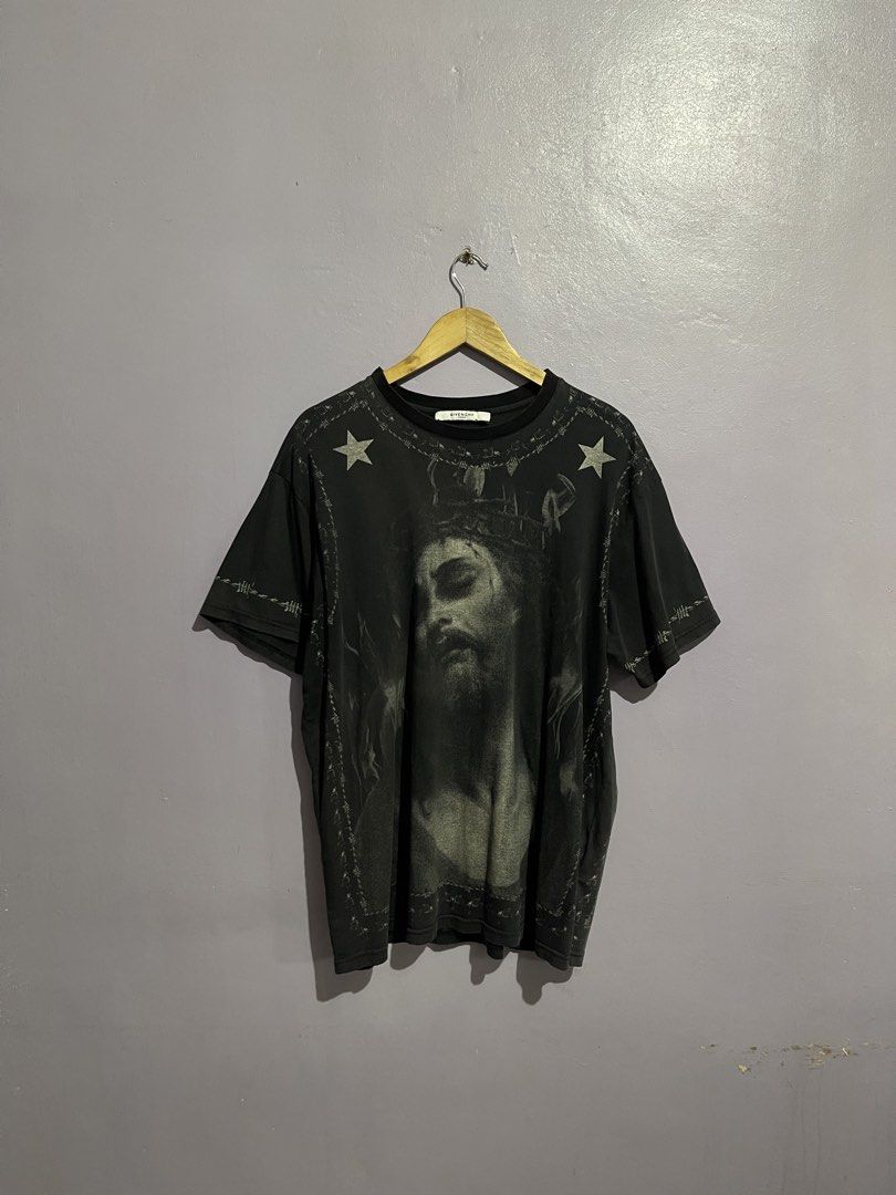 Givenchy Jesus Tee (Category: Tshirts & Polo Shirts ) located in Angeles City. Submitted by andreiboughts (Listing ID 1468645415, Image 1). Description: Length: 29 Width: 22 Condition: 8.5/10 Color rate: 8.5/10 Issue (s): stretched neckline, minimal loose stitching, color rate Complete Tags ✅ Small on tag.