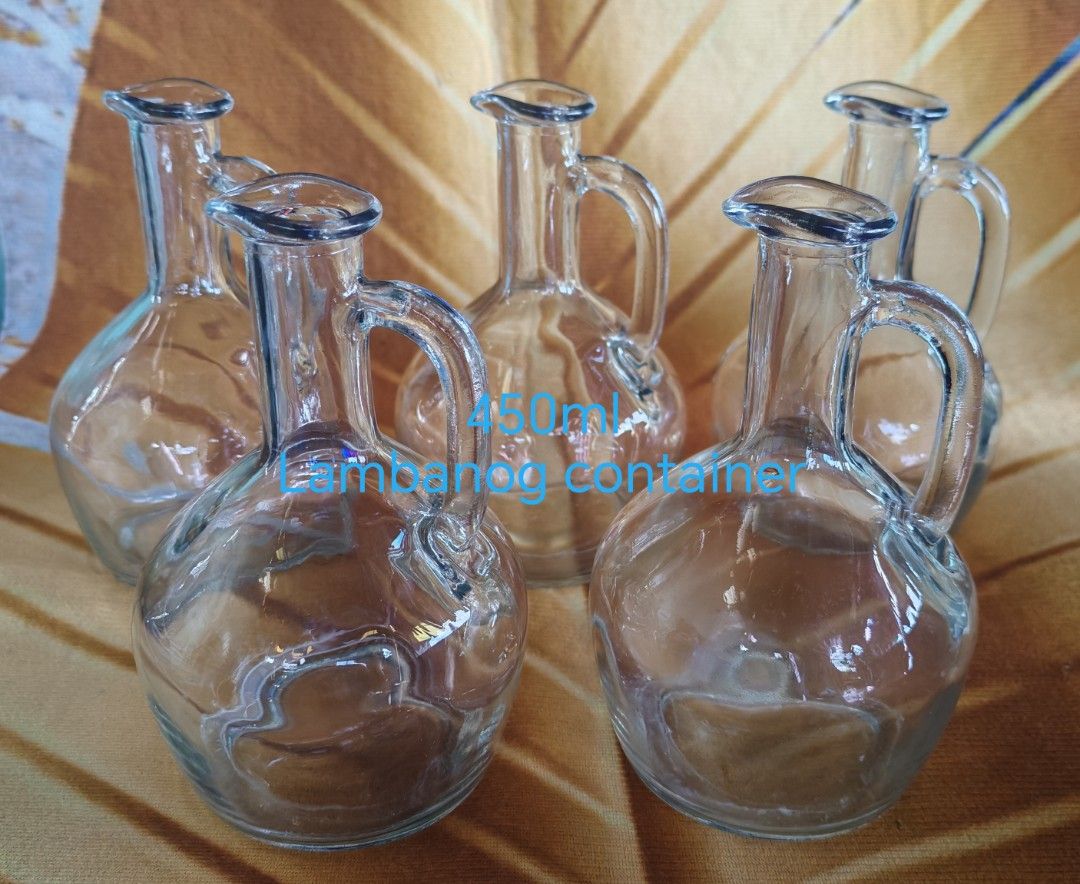 Glass lambanog container with handle take all (Category: Pitchers & Dispensers) located in Quezon City. Submitted by plantcorner (Listing ID 1411849457, Image 1). Description: Walang takip.
