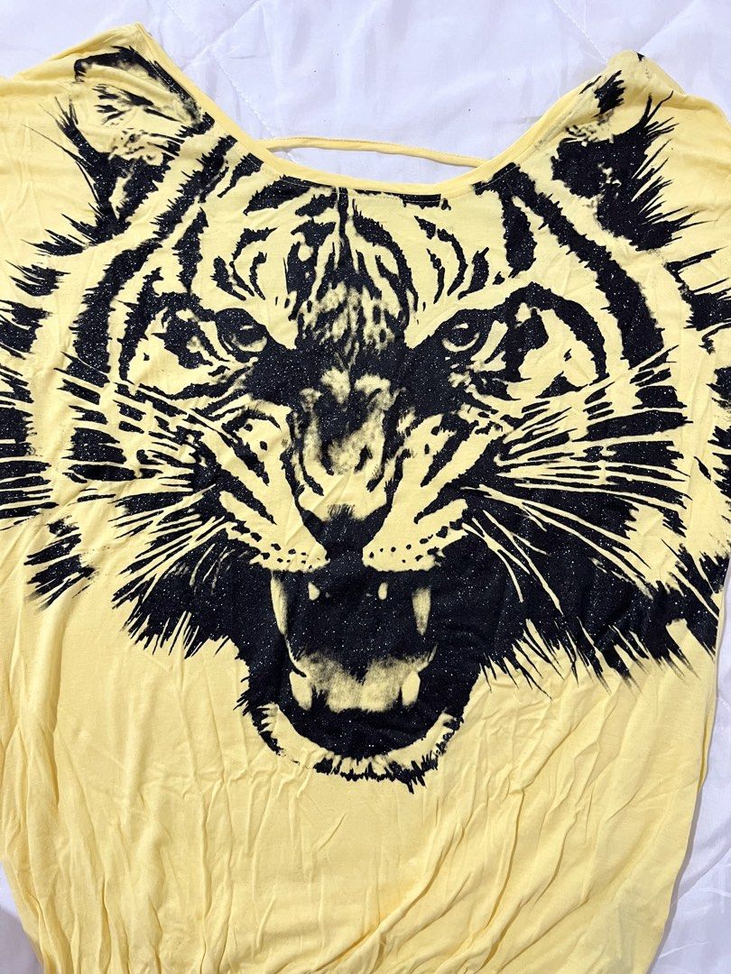 Glittery Tiger Y2K Graphic Yellow Top (Category: Others Tops) located in Naga. Submitted by itsrhoda (Listing ID 1468539374, Image 3). Description: 𝐓𝐇𝐈𝐑𝐓𝐘-𝐓𝐇𝐈𝐑𝐃 𝐂𝐎𝐋𝐋𝐄𝐂𝐓𝐈𝐎𝐍 🌞🌤️🪐✨ A series of y2k/vintage masterpieces you badly desire to add to your set of handpicked clothes. READ! ✨ Kindly send a message with your NAME, ADDRESS, and CONTACT NUMBER after claiming. ✨ Every item is washed. ✨ Manage your expectations, as these a