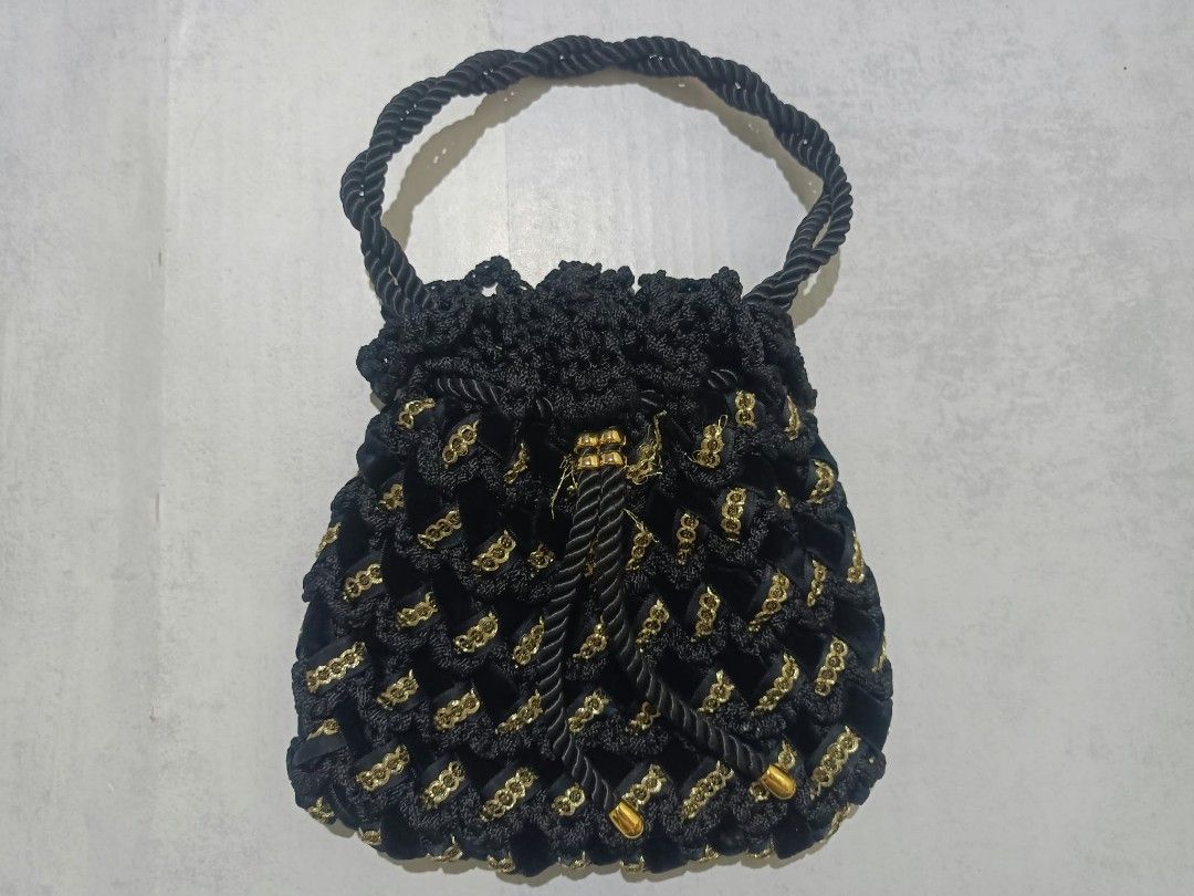 Gold and Black Woven Drawstring Pouch Bag (Category: Purses & Pouches) located in Davao. Submitted by lotispreloved (Listing ID 1468618391, Image 1). Description: .