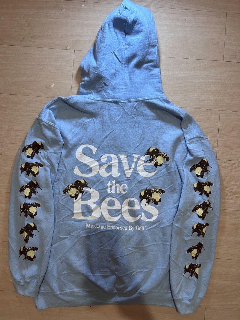 GOLF Le Fleur Save The Bees Hoodie Blue Medium (Category: Coats, Jackets and Outerwear) located in Dipolog. Submitted by adrian281994 (Listing ID 1468628980, Image 1). Description: - Brand: Golf Wang (Tyler, The Creator - Flower Boy era) - Item: Save The Bees Hoodie - Color: Light Blue - Size: Medium - Details: Graphic bees on both sleeves, large back print, and 'Flower Boy' text on chest - Features: Kangaroo pocket and intact original drawstring