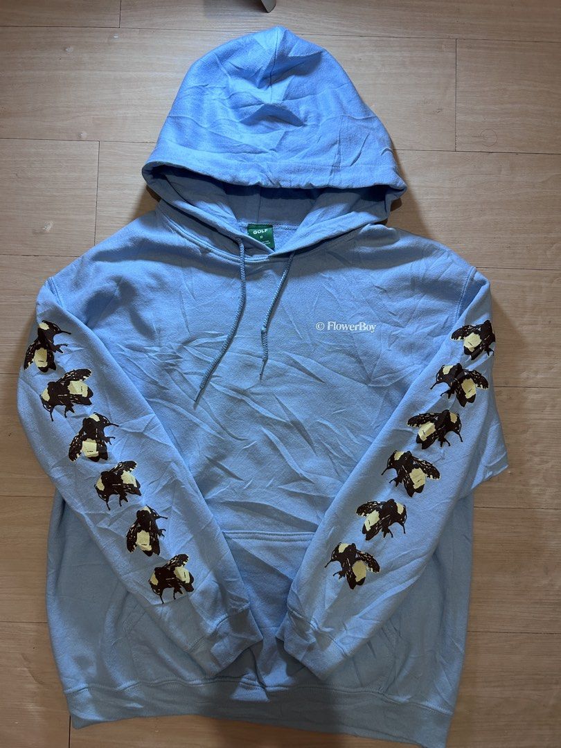 GOLF Le Fleur Save The Bees Hoodie Blue Medium (Category: Coats, Jackets and Outerwear) located in Dipolog. Submitted by adrian281994 (Listing ID 1468628980, Image 3). Description: - Brand: Golf Wang (Tyler, The Creator - Flower Boy era) - Item: Save The Bees Hoodie - Color: Light Blue - Size: Medium - Details: Graphic bees on both sleeves, large back print, and 'Flower Boy' text on chest - Features: Kangaroo pocket and intact original drawstring