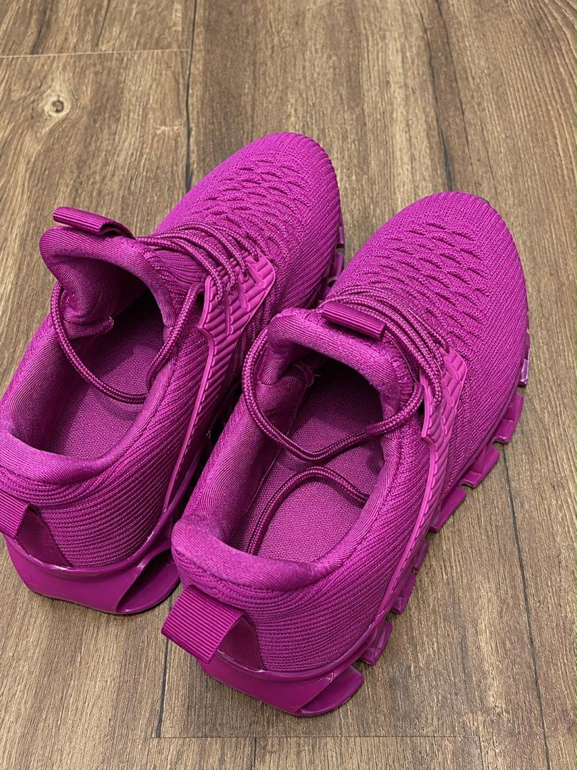 Good as new sneakers .. bright color👌 (Category: Activewear) located in Baliuag. Submitted by sirc_28 (Listing ID 1468571328, Image 1). Description: bright magenta or rose-pink knit athletic sneakers featuring a distinctive hollow or “blade”-style cushioned sole and lace-up.