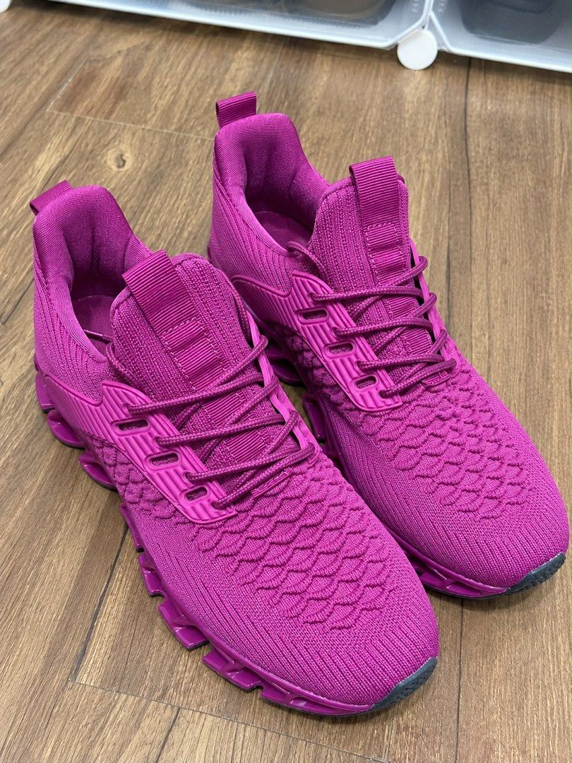 Good as new sneakers .. bright color👌 (Category: Activewear) located in Baliuag. Submitted by sirc_28 (Listing ID 1468571328, Image 2). Description: bright magenta or rose-pink knit athletic sneakers featuring a distinctive hollow or “blade”-style cushioned sole and lace-up.