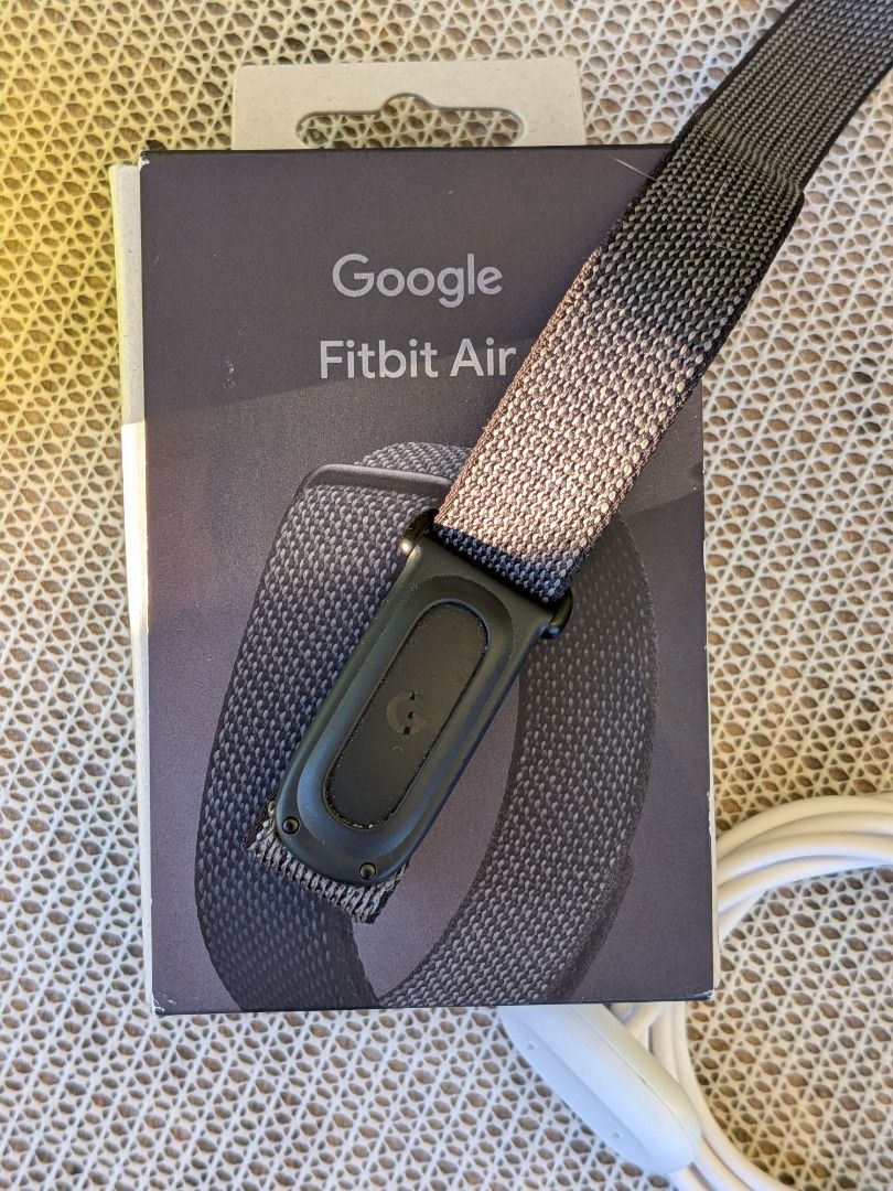 Google Fitbit Air (Black) (Category: Wearables & Smart Watches) located in Mandaluyong City. Submitted by k-guico7 (Listing ID 1468589713, Image 3). Description: - Ultra lightweight and screenless fitness and health tracker, weighs only around 12 grams - 50m water resistance, which makes it safe for swimming, showers, or heavy sweat - Barely used - Battery lasts for up to 7 days - Works with bluetooth connection and compatible with the Google Hea