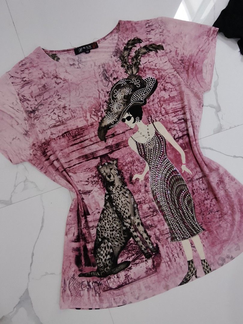 Graphic Print T-Shirt Bundle - Pink and Black (Category: Shirts) located in Manila. Submitted by keencrystal.595c28 (Listing ID 1468620149, Image 2). Description: - 2-in-1 graphic t-shirt bundle for one affordable price - Pink tee features a rhinestone-embellished vintage lady and cheetah print - Black tee features a fashion illustration with sparkly gold glitter accents - Classic crew neck and short sleeves - Made with soft, comfortable cotton f